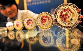 澳洲龙年彩色金银币在京首发